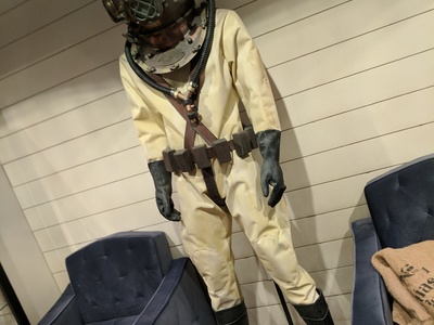 We created this vintage dive suit and helmet for a den of antiquities themed lobby at the San Francisco Niantic headquarters. 	