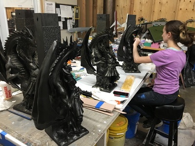 These are custom sculpted Dungeons and Dragons table legs featuring a dragon battling a giant for a D&D gaming table for the show Super-Fan Builds. http://youtu.be/ghBB3jnHrhs 	