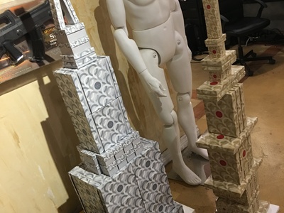 These are gift box tower props for an Elizabeth Arden photo shoot in New York for a Christmas ad campaign. 	