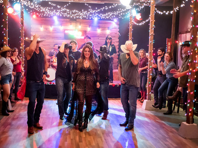 This is the line-dancing scene of Dianña's music video " Andale Yeehaw" that was shot on our country bar pop up set.